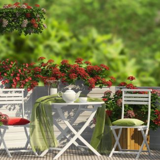 furniture and flowers on the balcony

