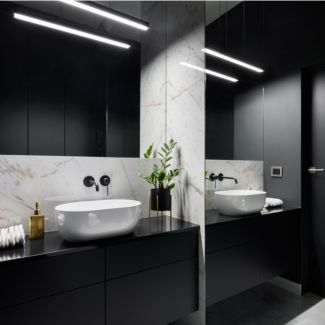 elegant black bathroom with mirror wall