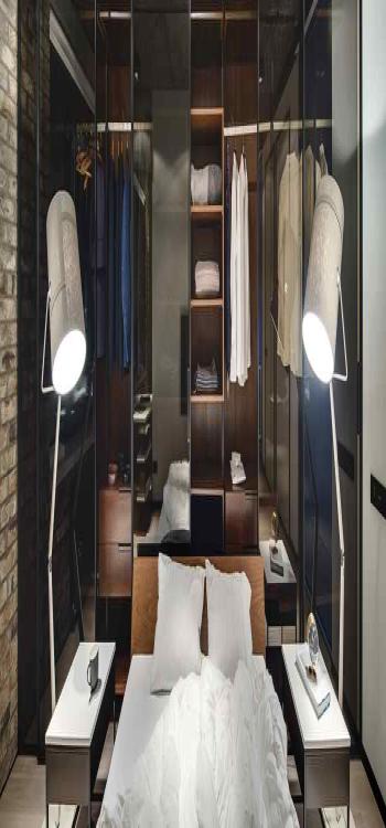 4. A Glass Sliding Wardrobe Design with Two-Tone 