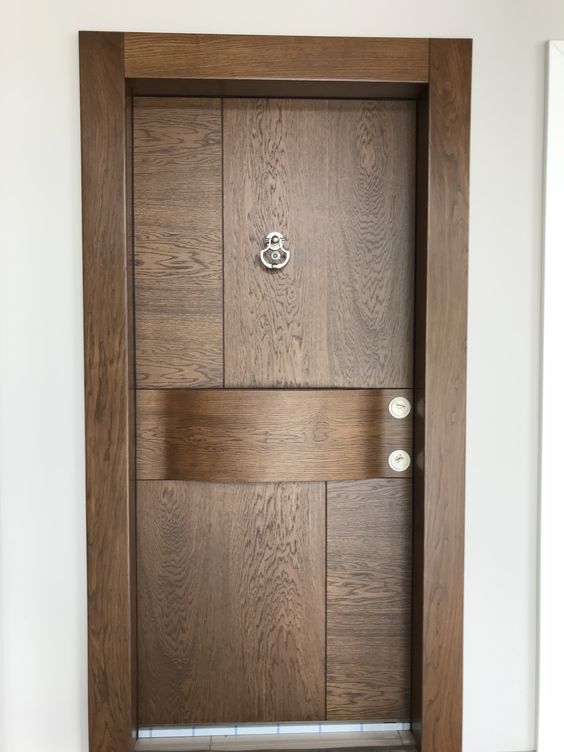 A panel door with a two-toned wood design