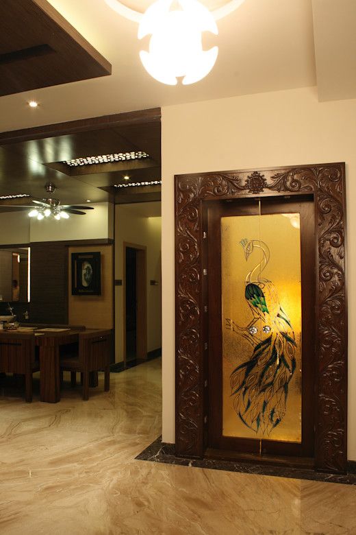 Decorate Pooja Room with a Glass Design Embed into Carved Wood for Pure Royalty