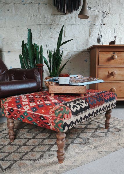 Upcycle old footstools into full-fledged ottomans with quirky prints