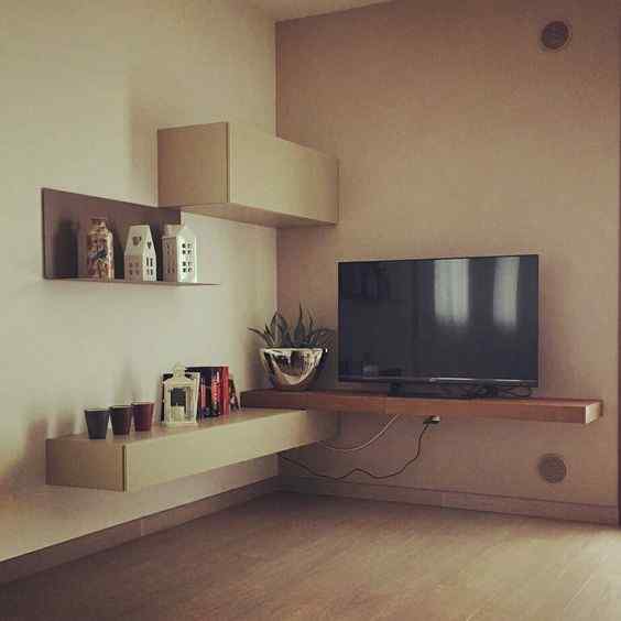 asymmetrical corner tv unit design for living room