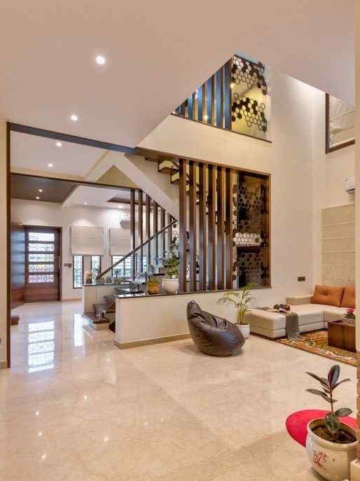 living duplex statement staircase house interior design