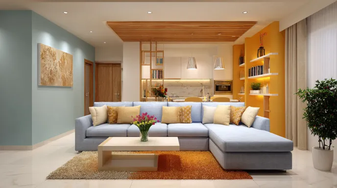 Vibrant bhk interior with a blue sofa and bright orange accent wall