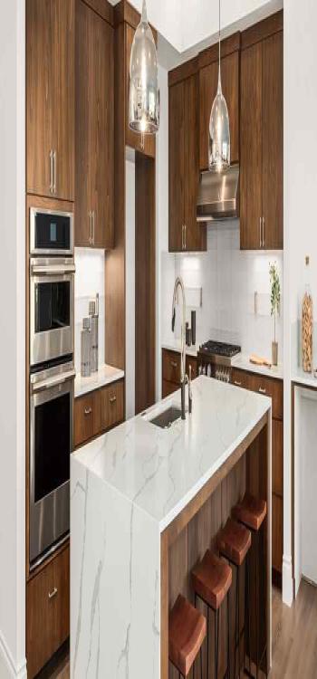 C-Shaped Kitchen Design With A Wood-Inspired Design