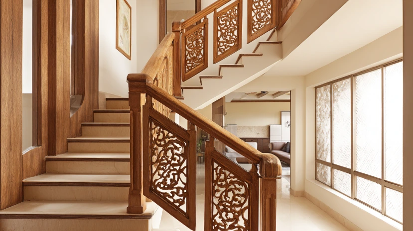 carved wood detailing featured in classic stair railing design
