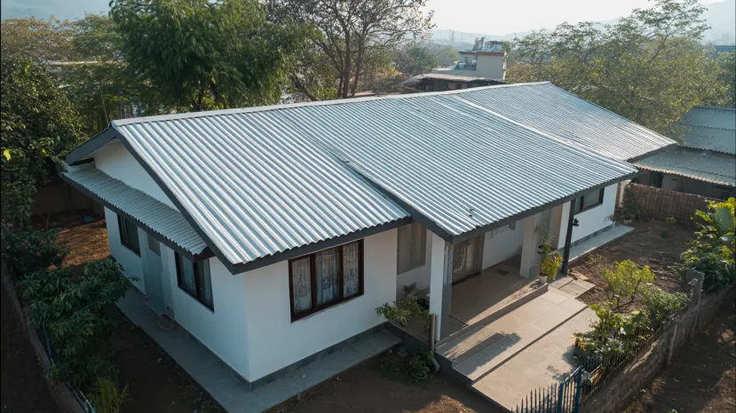 Galvanized corrugated roof sheet design for white house.