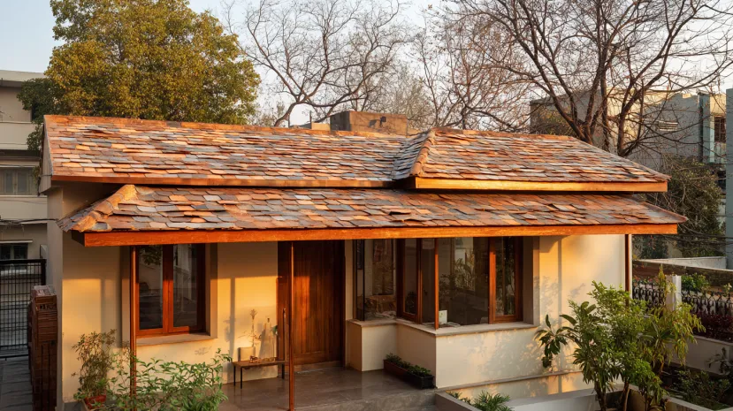 Sustainable eco-friendly metal roof tile installation.