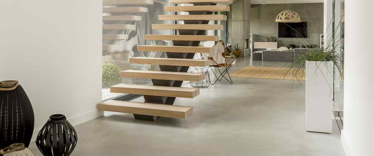 Curved fluid staircase design for modern home
