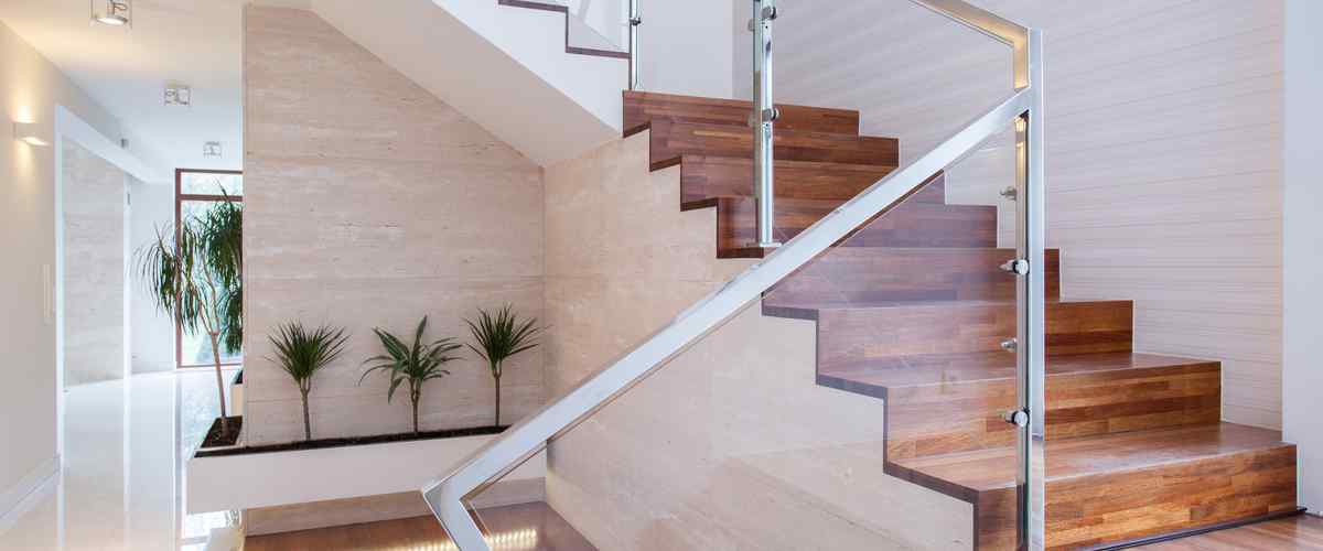 Staircase with glass railing or concealment design