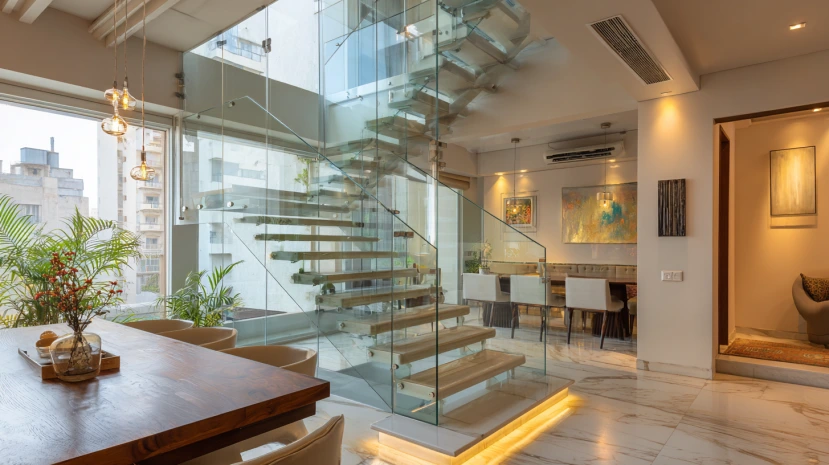 glass and steel blend featured in minimalist stair railing design