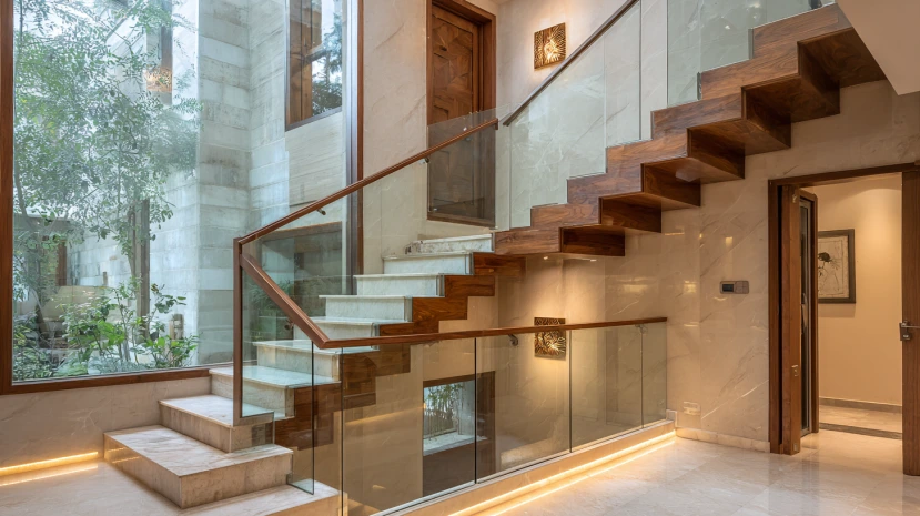 glass and wood blend featured in elegant stair railing design