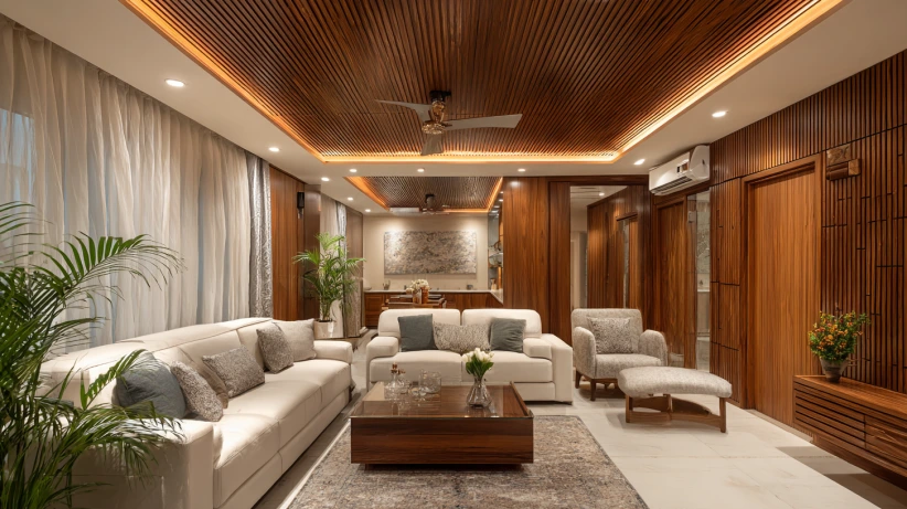linear wooden slats used in a simple main hall fall ceiling design