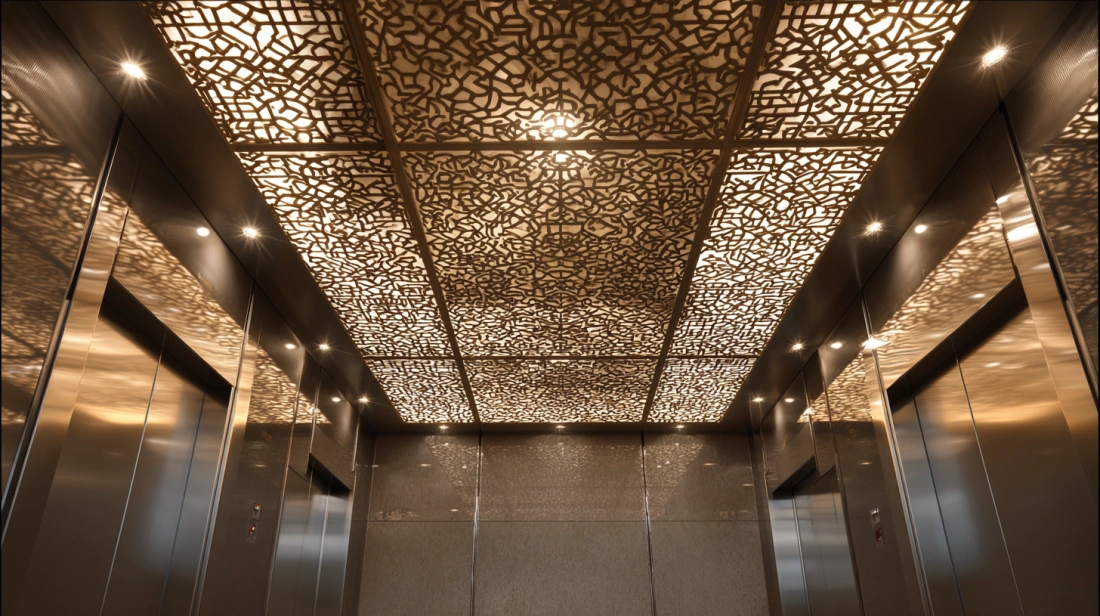 Lift ceiling with intricate laser-cut patterns and light