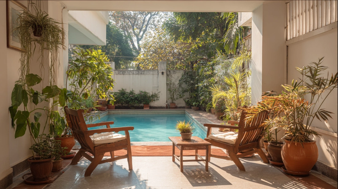 Pool facing apartment sitout with chairs