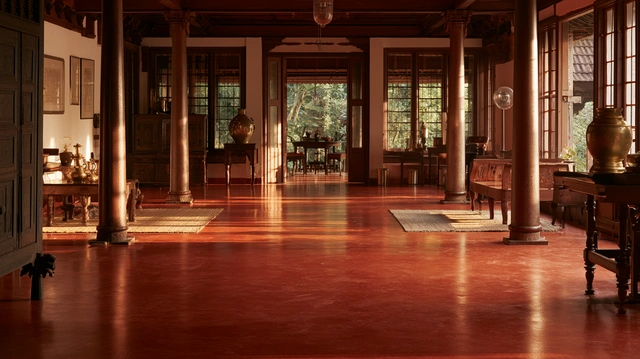 Artisan polishing traditional red oxide flooring