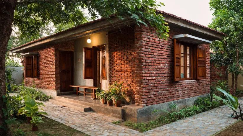 Rustic red brick 20 lakh house design exterior view