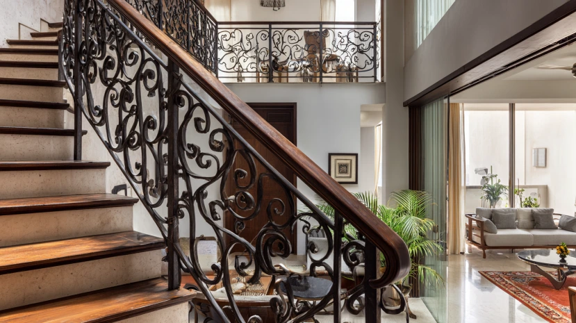 ornate iron detailing featured in traditional stair railing design