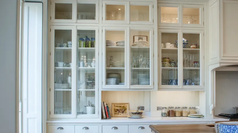 glass wardrobe design adapted as stylish glass cupboard for modular kitchen